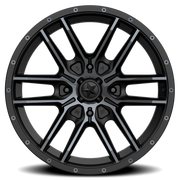 MSA Fang 15x7 +38 4x110mm 86mm Satin Black Titanium Tint